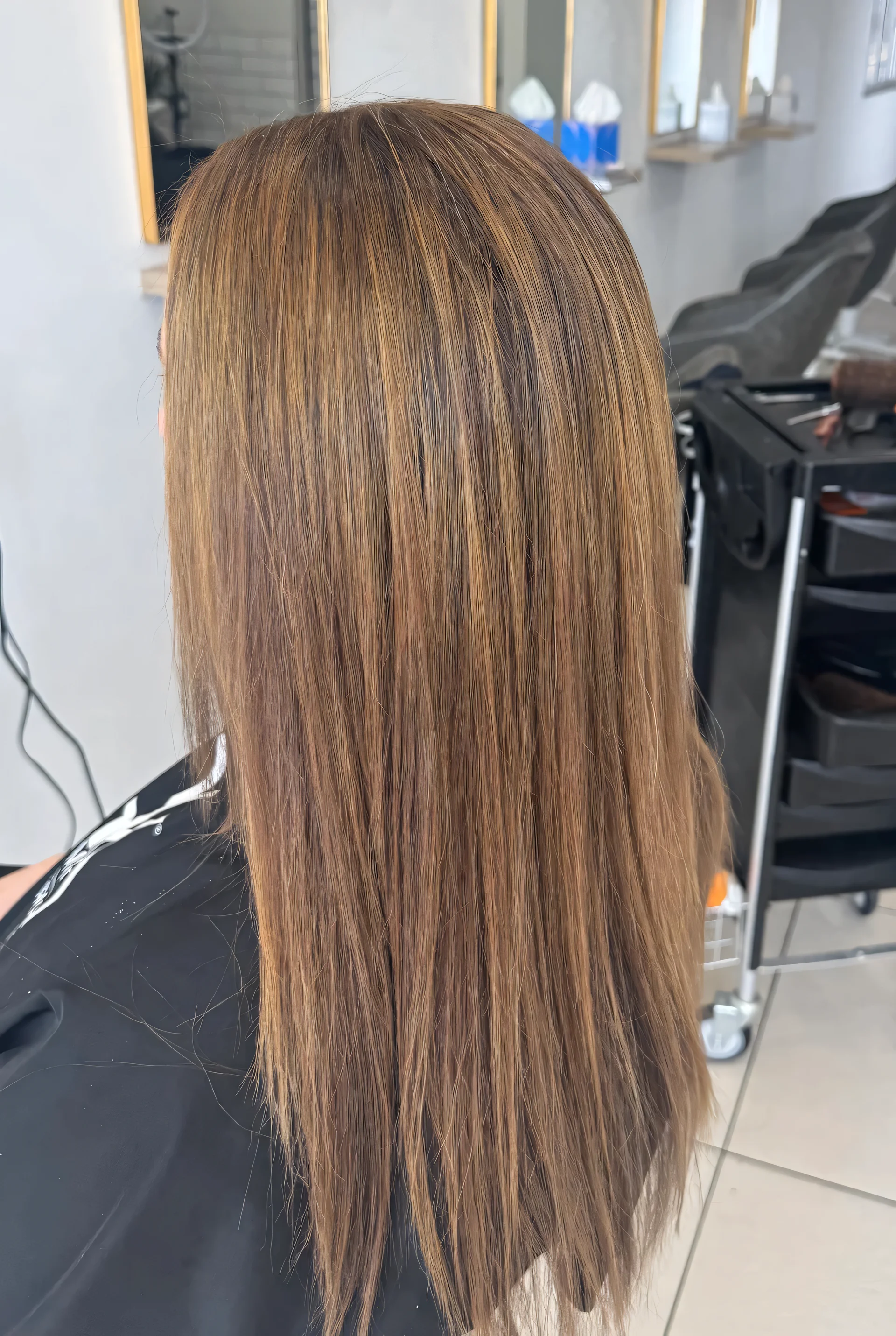 Caramel highlights after straightening